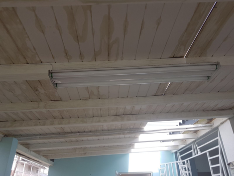 The damaged roof in the kitchen of Carrasquillo’s nursing home.